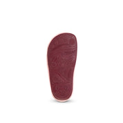 Suela flexible de calzado respetuoso para bebé en color rosa, base antideslizante y plana que permite el movimiento natural del pie
